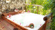 Karmairi Hotel Spa - Após pegar uma praia, que tal um banho relaxante na hidromassagem ao ar livre? 