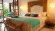 Karmairi Hotel Spa - Os quartos esbanjam estilo com móveis artesanais de Bali e materiais naturais. 