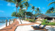 Palm Island Resort - A Beachfront Room tem um pedaço de praia com vista para as outras ilhas do arquipélago