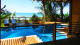 Baixú Village Hotel - O hotel conta com 2 piscinas, para que relaxe enquanto sente a brisa do mar.