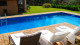 Barra do Bié - A piscina climatizada conta com bar e confortáveis camas espreguiçadeiras, descanso garantido!