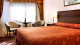 Calafate Parque Hotel - Delícias e descanso na acomodação Standard, de 25 m² e equipada com TV, calefação, frigobar e amenities.