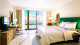 Dreams Curaçao Resort - Para descansar, entregue-se à suíte Deluxe Island View. Com 32 m², ela é equipada com TV, AC, frigobar e amenities.