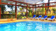 Esquilo Hotel & Chalés - Academia de vista para as montanhas e piscina aquecida e coberta, assim como a hidromassagem.