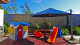 Hotel Aretê - As crianças também se divertem com os brinquedos ao ar livre do playground infantil.