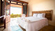 Hotel Praia dos Carneiros AFT - As confortáveis acomodações contam com TV, frigobar, ar-condicionado e varanda, e são perfeitas para o descanso.