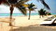 Le Rêve Hotel e Spa - Aproveite do sol e do serviço de praia do hotel nas espreguiçadeiras de sua praia privativa 