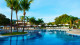 Jequitimar Guarujá Resort - Comece aproveitando as duas piscinas ao ar livre climatizadas, uma para adultos e outra exclusiva de uso infantil.