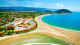 Jequitimar Guarujá Resort - O resort está em frente à Praia de Pernambuco, onde o completo serviço de praia marca presença.