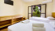 Vilage Inn Poços de Caldas - O apartamento de 25 m² garante o descanso. São duas opções, ambas equipadas com TV, AC e frigobar.