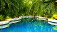 Villa Bebek - Destaque especial para a piscina que mais se parece com um rio, a qual ainda oferece serviço de bar.