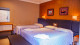 VOA Hotel Paraíso das Águas - Já o descanso acontece em uma das confortáveis acomodações, equipadas com TV, ar-condicionado e frigobar.
